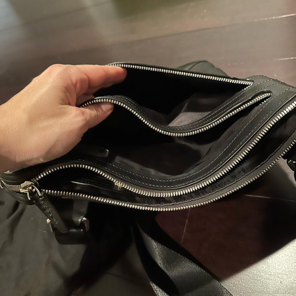 Tumi crossbody bag.